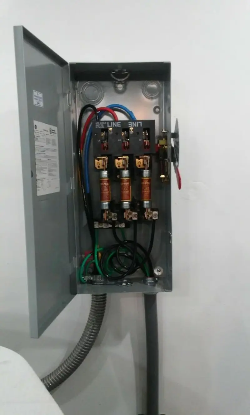 Three-phase disconnect switch installed for Smoke Detector Installation in Mayflower Village
